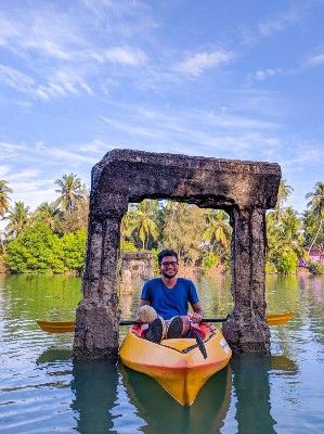 kayaking under broken bridge